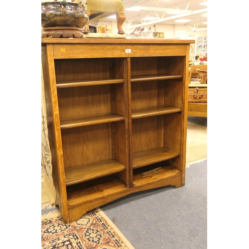 718 - Oak double fronted open bookcase, width 107cm, depth 32cm, height 115cm