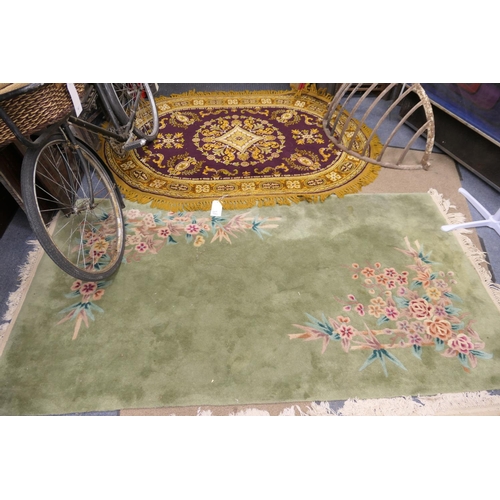 752 - Traditional Chinese sage green woollen rug; also a further patterned woollen rug (2)