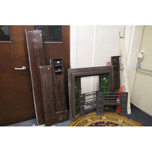 756 - Victorian cast iron and tiled fire grate with a polished slate and faux scagliola effect surround