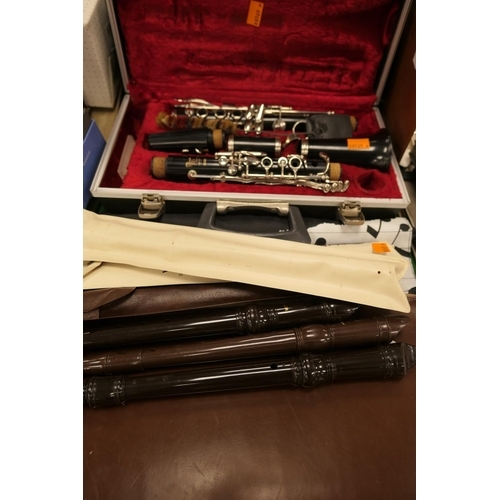 174 - Boosey & Hawkes cased clarinet and three recorders