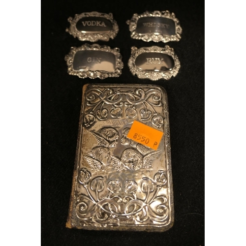 320 - Edwardian silver faced Common Prayer book, Chester 1904; also two modern silver decanter collars, gi... 