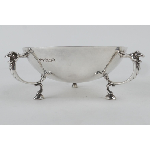 259 - Modern silver bowl by Mappin & Webb, Sheffield 1993, circular form with three lion's mask lug suppor... 