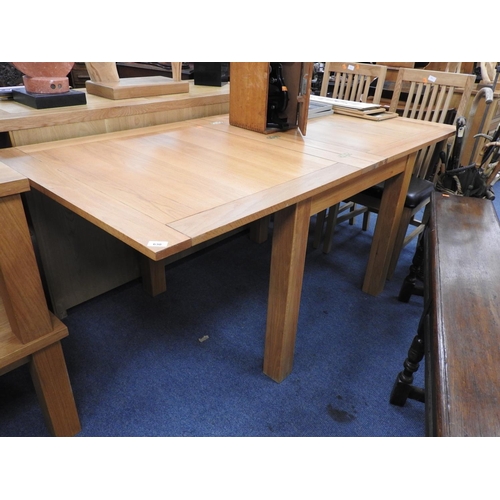 630 - Oak extending dining table with foldover top, the table when extended 180cm x 90cm, closed 90cm squa... 