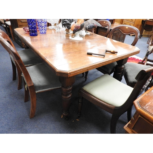 655 - Victorian walnut wind out dining table, with winder and one extra leaf, when extended 148cm x 102cm