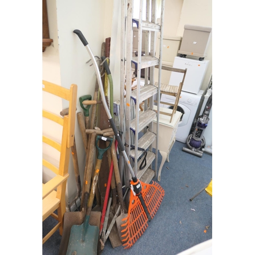 468 - Aluminium stepladders, wooden handled gardening tools including two person wood saw etc