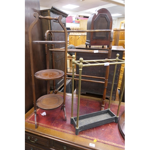 524 - Edwardian brass stick stand, also a mahogany folding cake stand and a mahogany towel rail (3)