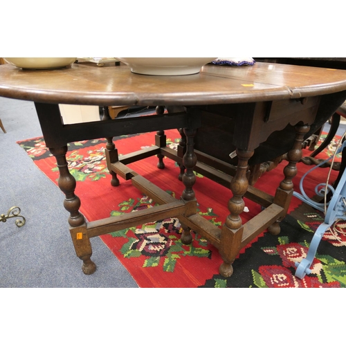 597 - Oak gateleg table, 18th Century and later