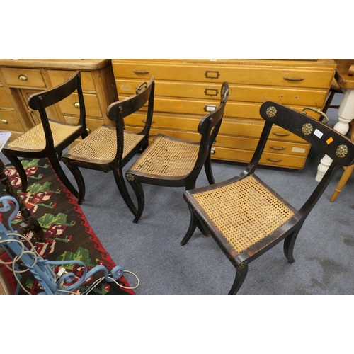 599 - Set of four Regency stained beech cane seated dining chairs, one stamped 'Gee'