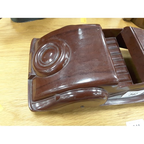 342 - English made bakelite streamlined motor car, length bumper to bumper 34.5cm, width 14cm