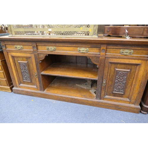 634 - Victorian carved oak sideboard, circa 1870, width 214cm