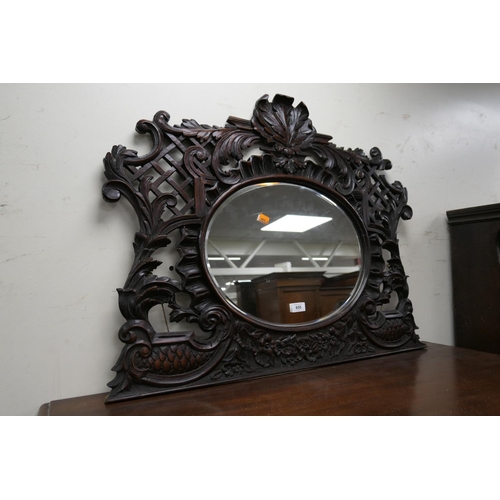 650 - Decorative Baroque style carved wooden over mantel mirror, width 88cm