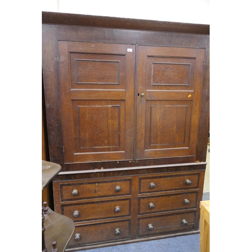 665 - Early 19th Century oak and mahogany banded housekeeper's cupboard, width 144cm x 200cm