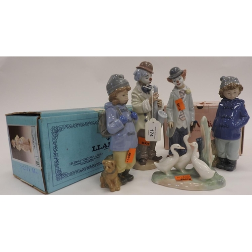 174 - Two Lladro clowns and three Nao figures, all boxed (5)