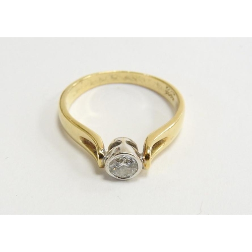 300 - 18ct gold diamond solitaire ring in two colour gold, the stone approximately 0.33ct, gross weight 4.... 