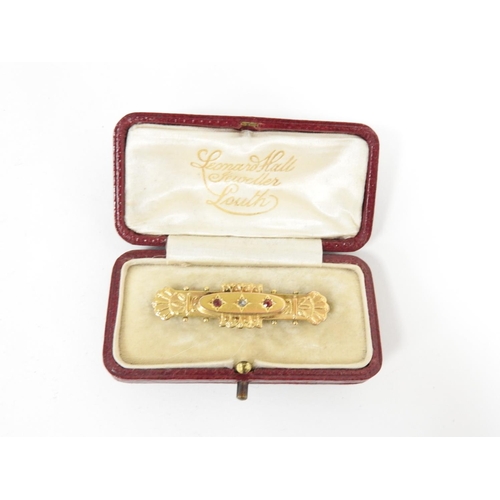 310 - Edwardian 9ct gold bar brooch set with tiny ruby and diamond in fitted box, hallmarked Chester 1901