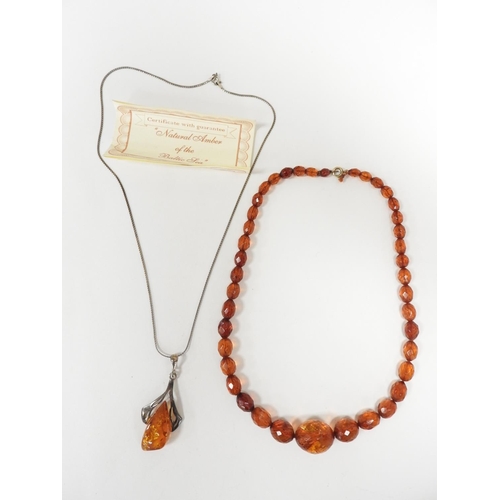 338 - Baltic amber silver pendant necklace; also a Baltic amber faceted bead necklace (2)