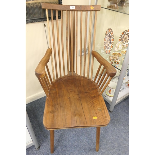 389 - Unusual walnut armchair in the Cotswold style