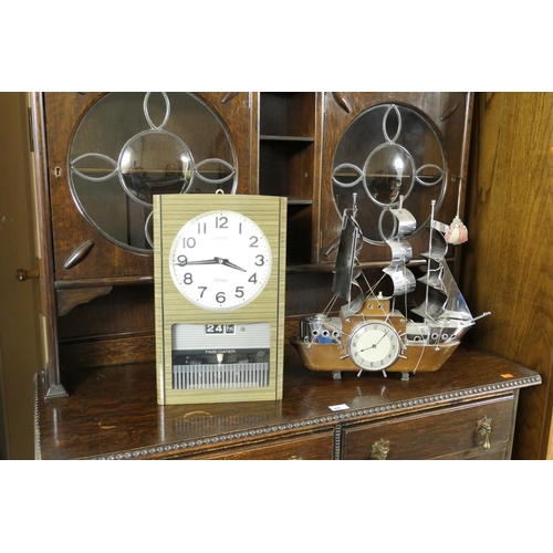 407 - Novelty mariner's mantel clock in the form of a sailing boat, height 43cm, width 46cm; also a Seiko ... 