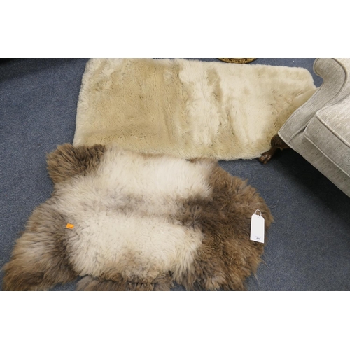 445 - Sheepskin rug and a Sycliffe mohair rug (2)