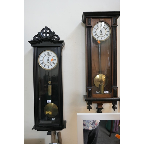 552 - Vienna single weight driven wall clock in ebonised case; also a further Vienna single weight wall cl... 