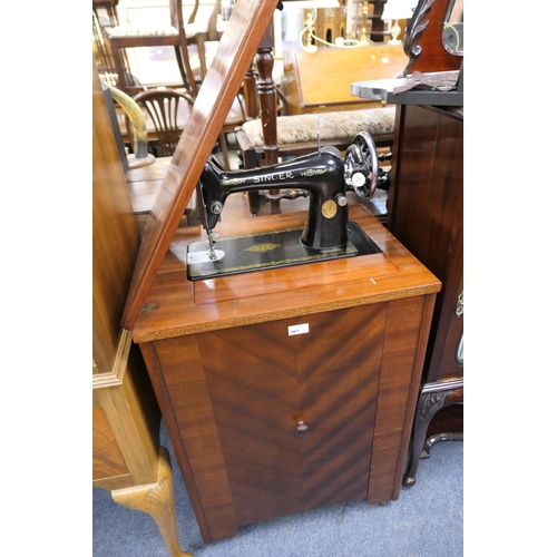 661 - Singer treadle sewing machine in mahogany cabinet