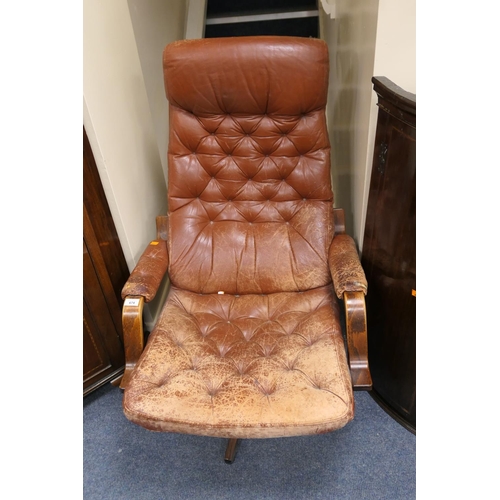 674 - Retro bentwood and brown leather upholstered swivel easy chair