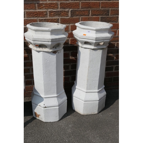 779 - Pair of white painted octagonal chimney pots, height 92cm