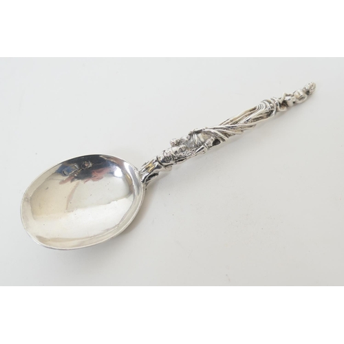 188 - Augsburg cast silver spoon, 18th or 19th Century, import marks for 1903, the bowl cast with an angel... 