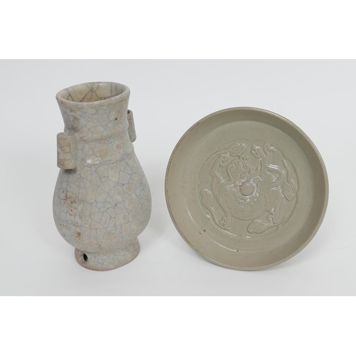 25 - Korean celadon dragon dish, shallow form relief moulded with a dragon flying amidst clouds, 16.5cm d... 