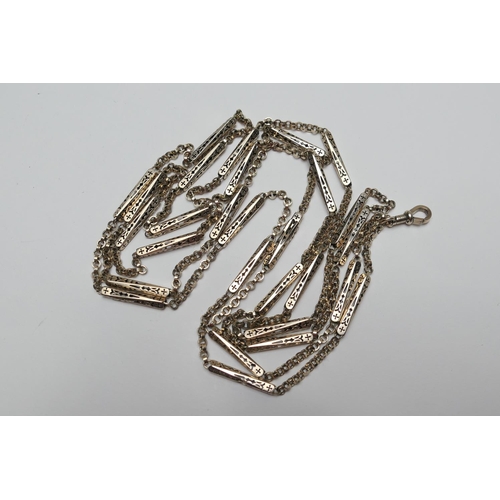 402 - Gold fancy bar and chain link guard chain, with spring clip, length 142cm, unmarked but tests as 14c... 