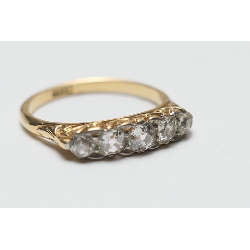 447 - Diamond five stone ring in 18ct gold, the old round cut diamonds totalling approx. 0.6ct, size N, gr... 