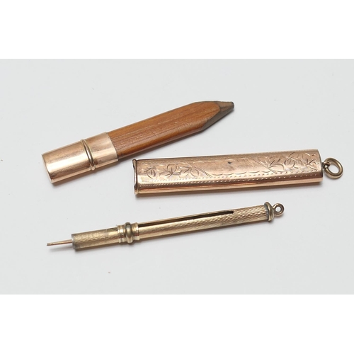 487 - 9ct gold pencil holder, Birmingham 1904, weight approx. 2.8g; also a 9ct gold engine turned cigar pi... 