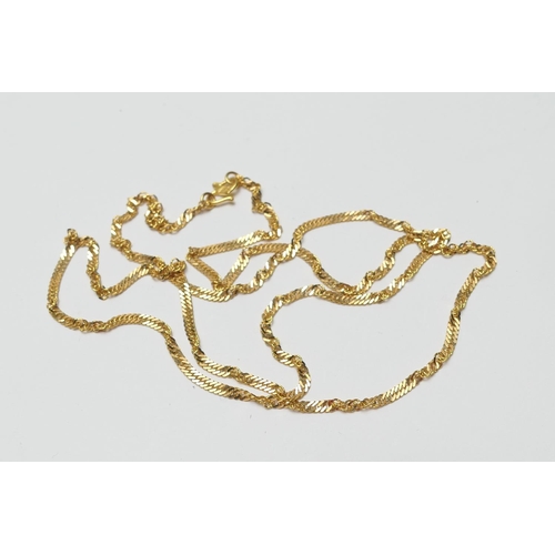 511 - Hong Kong yellow gold twisted flattened curb link necklace, marked '916', length 58cm, weight approx... 