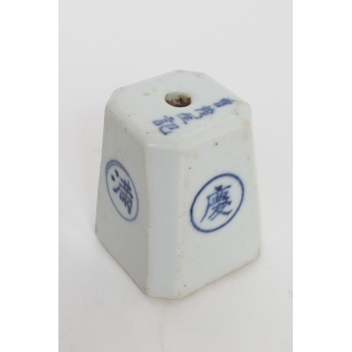 55 - Chinese blue and white bell weight or joss stick holder, late 19th Century, canted and tapered squar... 