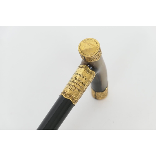 662 - George V presentation ebony walking cane, with a horn handle and gold plated mounts, 90cm