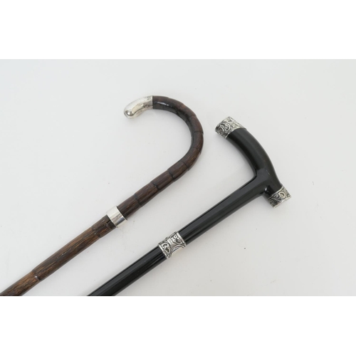 663 - Late Victorian silver mounted ebony walking cane, London 1900, height 92cm; also another walking can... 