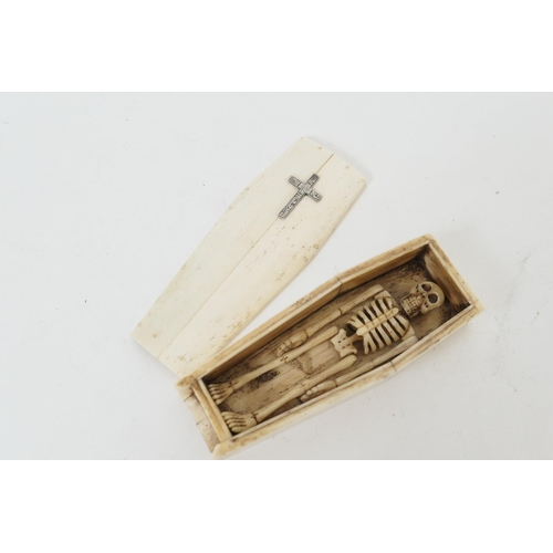 666 - French Napoleonic prisoner of war bone carving of an articulated skeleton in a coffin, 12cm x 4.5cm