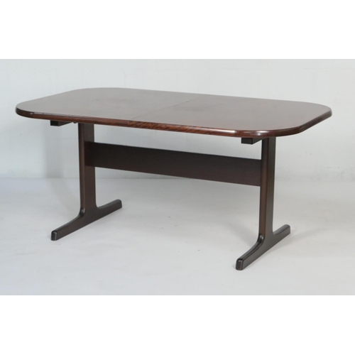 923 - C J Rosengaarden (Danish) rosewood extending dining table, circa 1975, the top with rounded edges, w... 