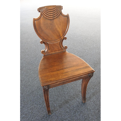 926 - Regency mahogany hall chair, circa 1815, shield shaped back raised on sabre forelegs, height 87cm, w... 