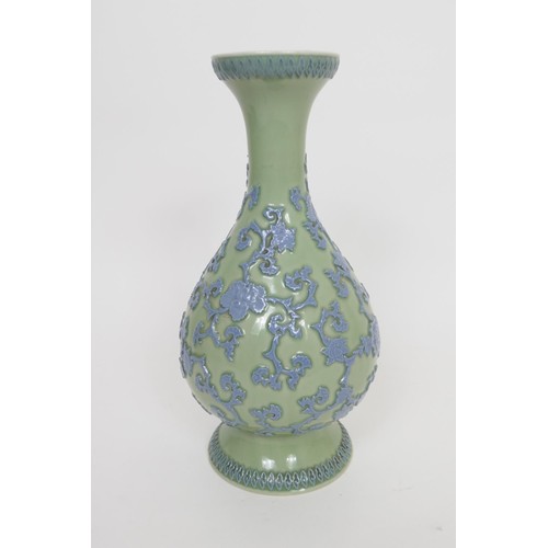 49 - Chinese Republic carved celadon vase, late 20th Century, trumpet baluster form carved with peony scr... 