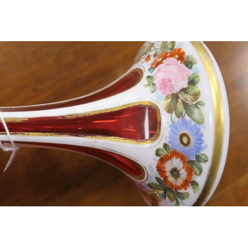 81 - Bohemian ruby and white overlay glass tazza, shallow bowl over a trumpet stem, decorated with polych... 