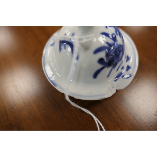 37 - Chinese blue and white wine jug, moon shape decorated with dragons scrolling amidst foliage in under... 