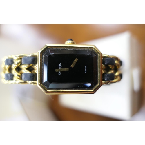 343 - Chanel 'Premiere' lady's gold plated quartz wristwatch, circa 1988, with box and papers
Please note ... 