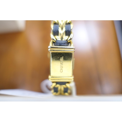 343 - Chanel 'Premiere' lady's gold plated quartz wristwatch, circa 1988, with box and papers
Please note ... 