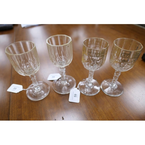 59 - Fifteen Regency gilded and faceted wine glasses, early 19th Century, the bowls decorated with ribbon... 