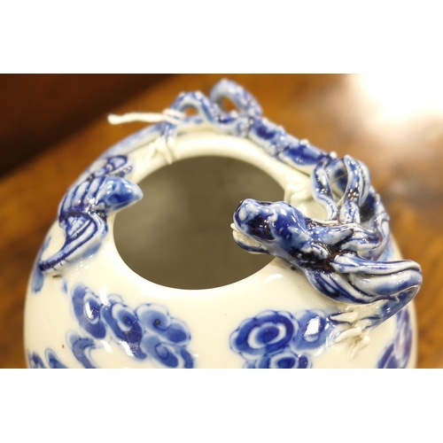 31 - Chinese blue and white ovoid vase, late 19th Century, having applied dragon and bat at the inverted ... 