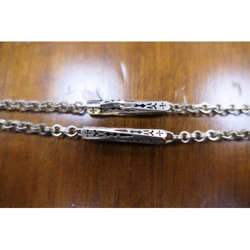 402 - Gold fancy bar and chain link guard chain, with spring clip, length 142cm, unmarked but tests as 14c... 