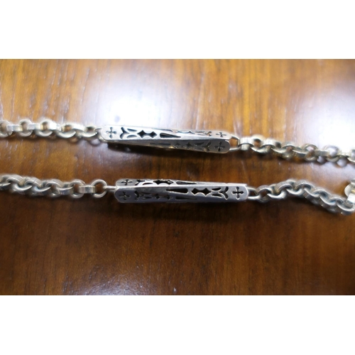 402 - Gold fancy bar and chain link guard chain, with spring clip, length 142cm, unmarked but tests as 14c... 