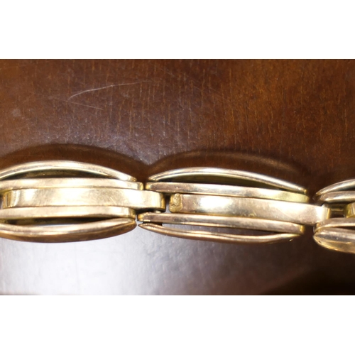 417 - 15ct gold bracelet, with oval shaped multi-bar links, with safety chain, marked '15', length 20cm, w... 