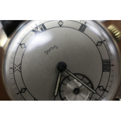 453 - Smiths 9ct gold gent's vintage wristwatch, circa 1947, manual wind, 30mm, on a leather strap; also a... 